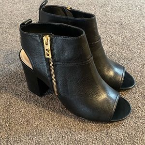 New Black Leather Cole Haan ankle boot heels, peep toe with gold zipper. Size 8